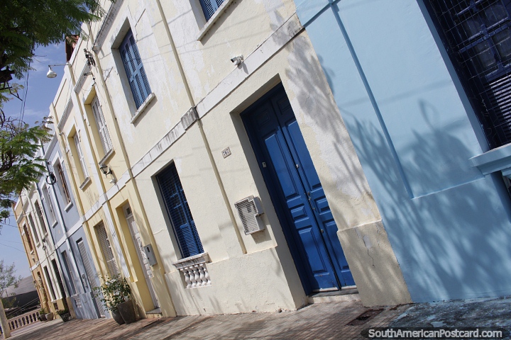Nice neighborhood of well-kept house-fronts and street in Corumba. (720x480px). Brazil, South America.