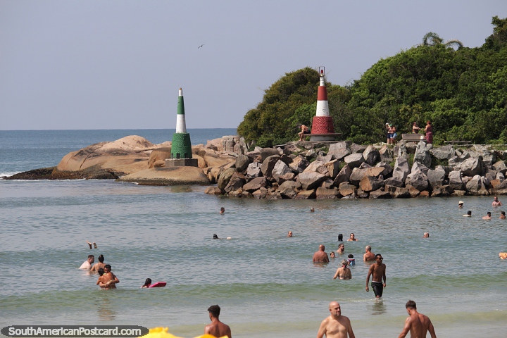 Pair of lighthouses on the rocky coastline at Barra da Lagoa in Florianopolis. (720x480px). Brazil, South America.