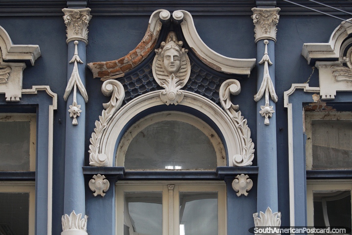 Antique building facade with face and flowers decoration in Porto Alegre. (720x480px). Brazil, South America.