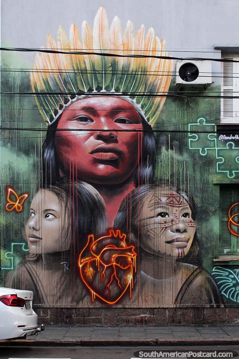 Indigenous man and 2 daughters, street art in Porto Alegre. (480x720px). Brazil, South America.