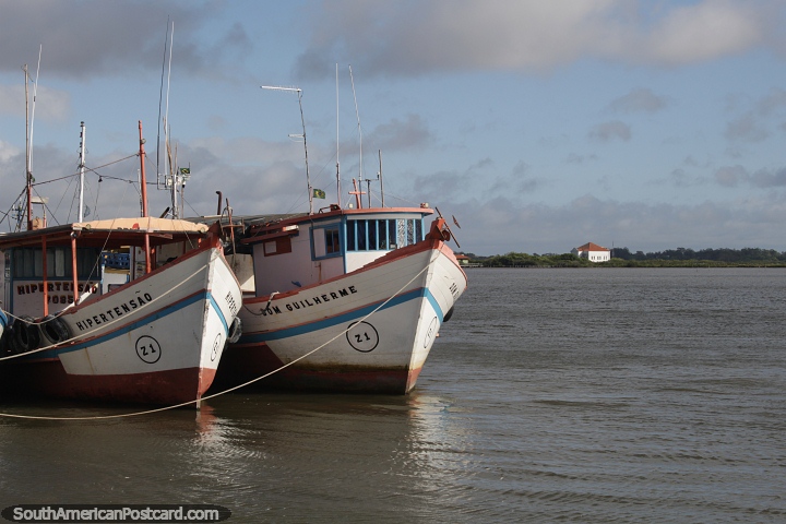 Pair of boats docked on the lake in Rio Grande. (720x480px). Brazil, South America.