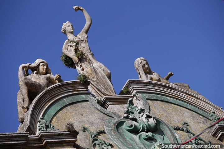 Art-deco from 1906 in weathered condition, 3 women on a building top in Rio Grande. (720x480px). Brazil, South America.