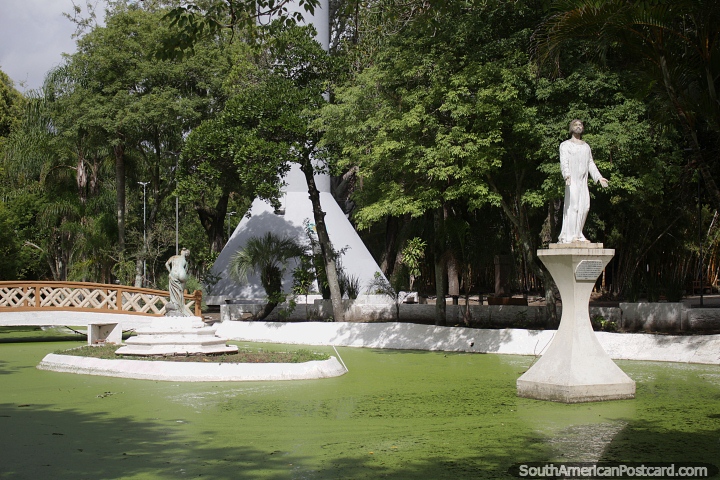 Jesus monument and a bridge over the water at Plaza Tamandare in Rio Grande. (720x480px). Brazil, South America.