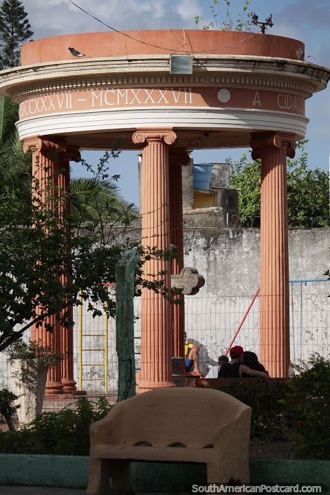 Plaza Bonfim with an attractive orange bandstand with Greek columns in Rio Grande. (480x720px). Brazil, South America.