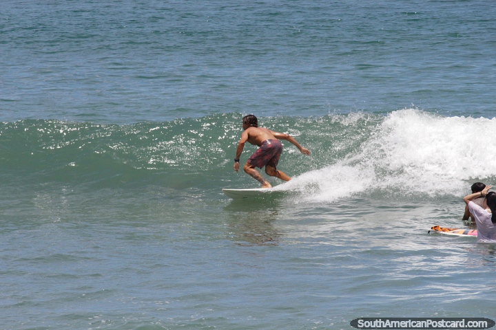 Surfing at Vermelha Beach in Ubatuba. (720x480px). Brazil, South America.