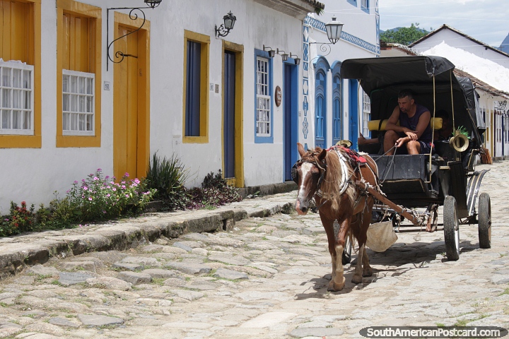 Horse and cart on a cobblestone street in Paraty. (720x480px). Brazil, South America.