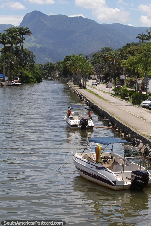 View upriver from the mouth to the mountains in Paraty. (480x720px). Brazil, South America.