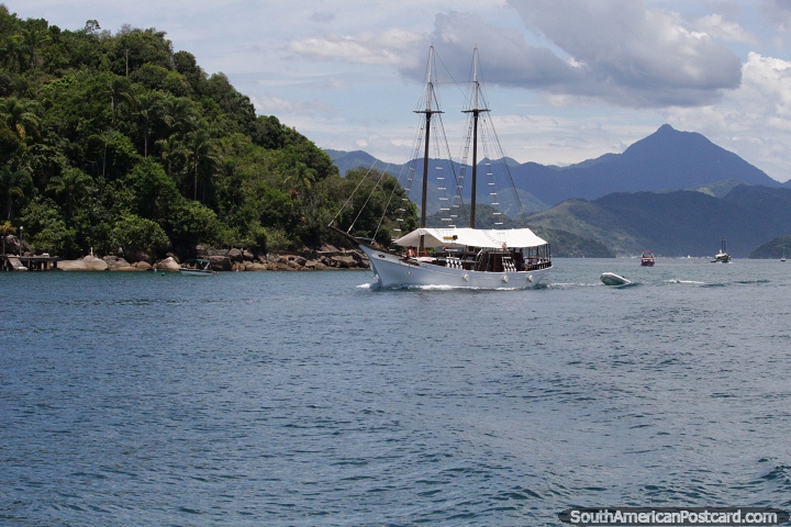 Great view from the boat and harbor back towards the mainland and mountains in Paraty. (720x480px). Brazil, South America.