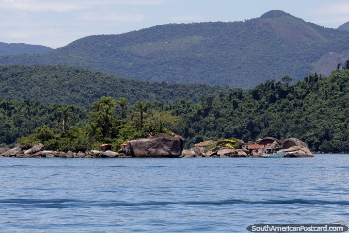 Island of boulders with palms and small buildings in Paraty. (720x480px). Brazil, South America.