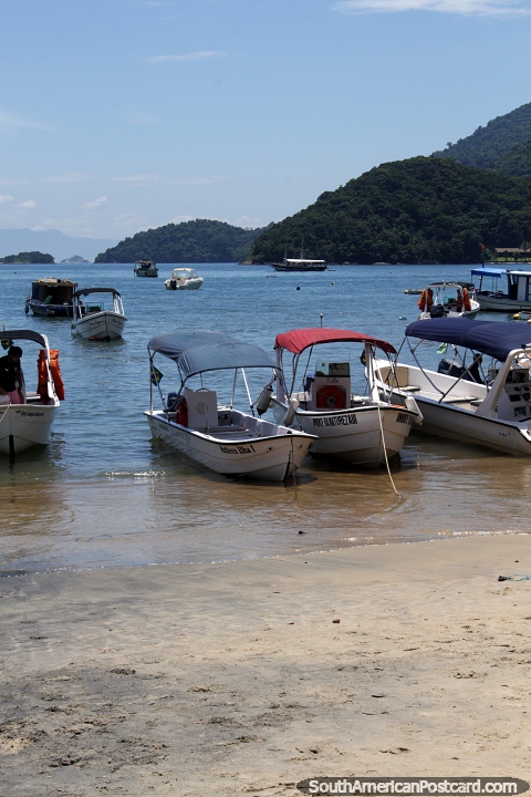 Beach and speedboats in Abraao, Ilha Grande. (480x720px). Brazil, South America.