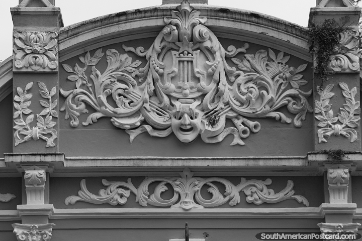 Ceramic decoration of a building featuring a face, plants and musical instruments in Petropolis. (720x480px). Brazil, South America.