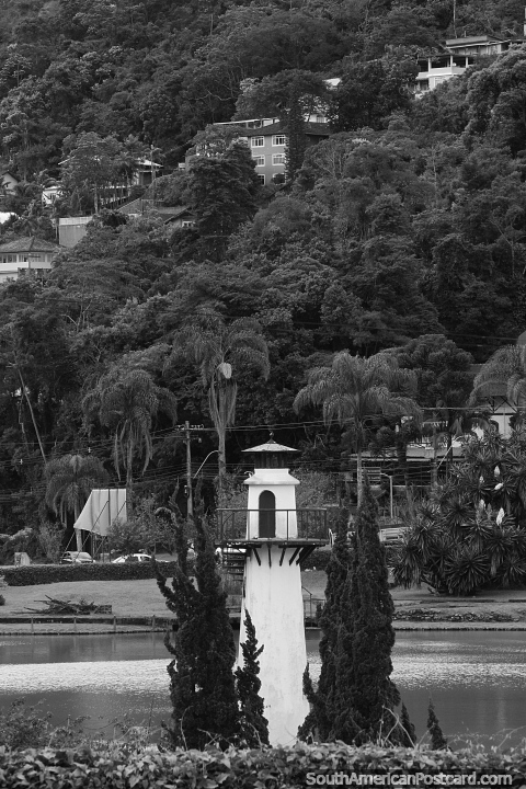 Lighthouse and lagoon at Quitandinha Palace in Petropolis. (480x720px). Brazil, South America.