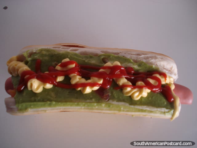 A Calama style hotdog with guacamole and mayonnaise and the ketchup I put on messily. (640x480px). Chile, South America.