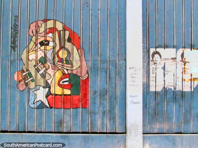 Abstract wall art and a poster near the port in Antofagasta. (640x480px). Chile, South America.