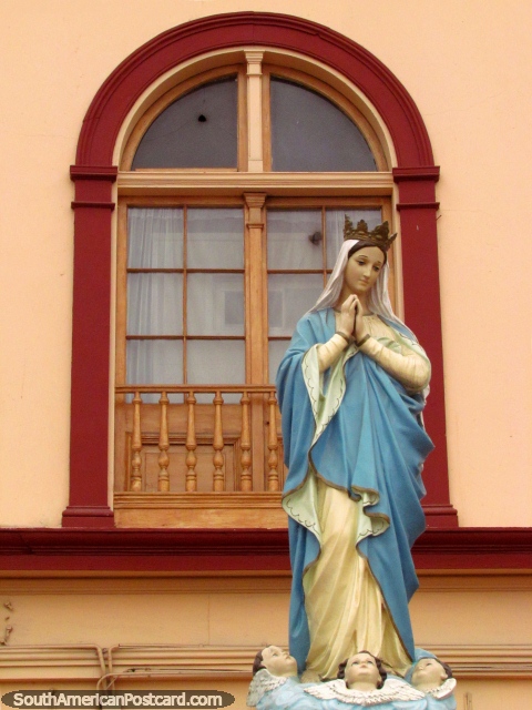 Religious statue with 3 angels at her feet at Casa de la Divina Providencia in La Serena. (480x640px). Chile, South America.