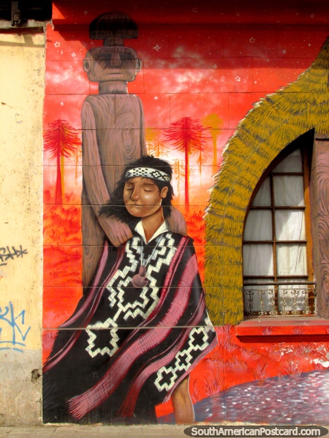An indigenous woman and her tree friend wall mural in the Brazil neighborhood in Santiago. (480x640px). Chile, South America.
