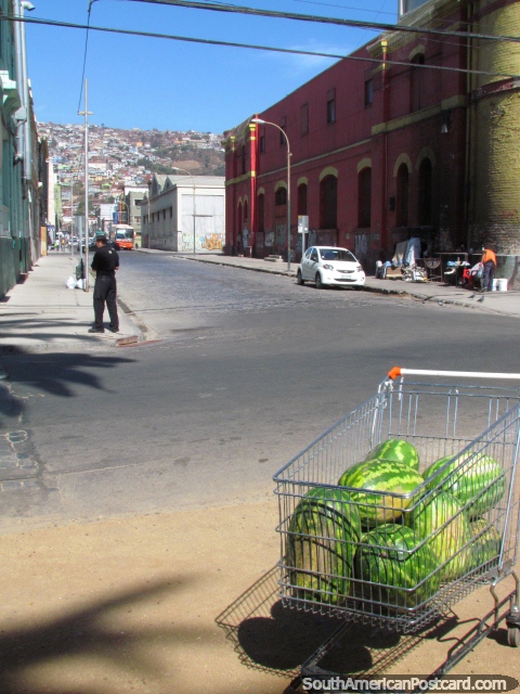 A trolley of watermelons on the street in Valparaiso. (480x640px). Chile, South America.