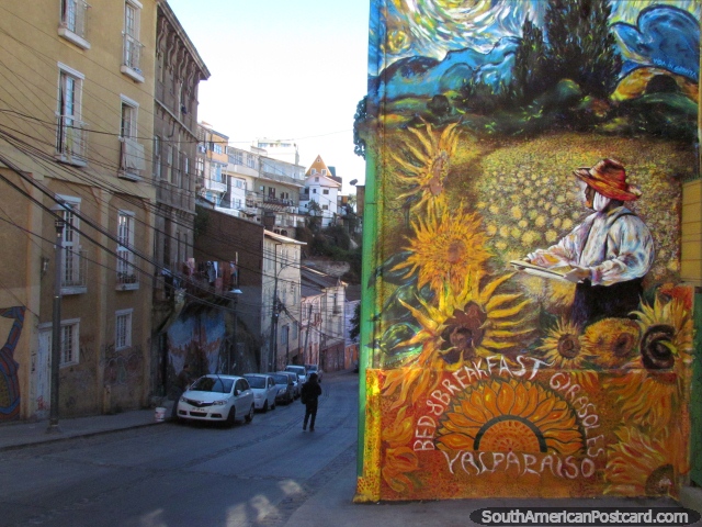 Nice mural beside the pavement of a man in a sunflower field in Valparaiso. (640x480px). Chile, South America.