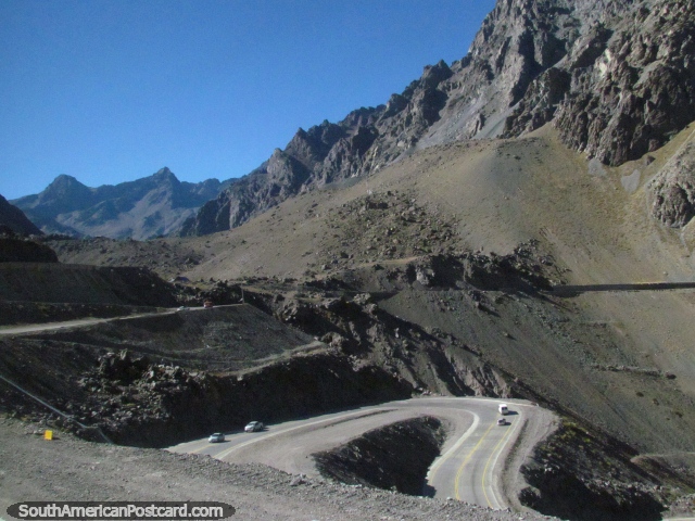 A road that crosses above and below itself with many curves up to Cristo Redentor. (640x480px). Chile, South America.