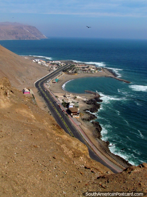 Looking down the coast away from central Arica from El Morro de Arica hill. (480x640px). Chile, South America.