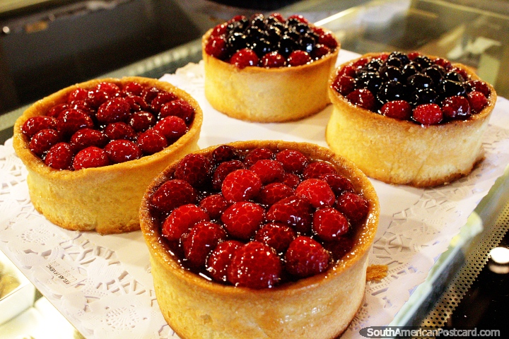 Raspberry and blueberry delights, fresh from the oven at Cafe de la P in Pucon. (720x480px). Chile, South America.