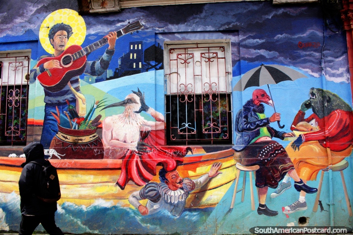 An exceptional mural in Valdivia featuring characters such as a turkey and a guitar player. (720x480px). Chile, South America.