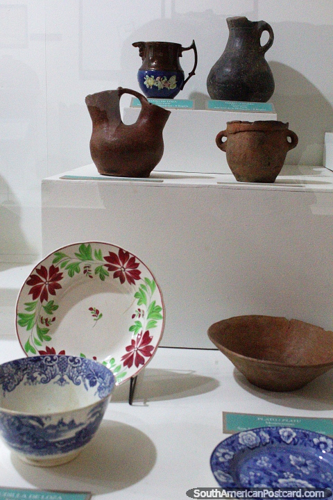 Ceramic plates and pots on display at the Museum of History and Anthropology in Valdivia. (480x720px). Chile, South America.