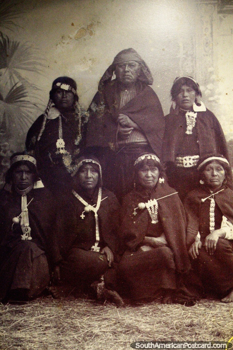 A group of Mapuche women, their jewellery  carries their family histories and tales, museum in Valdivia. (480x720px). Chile, South America.