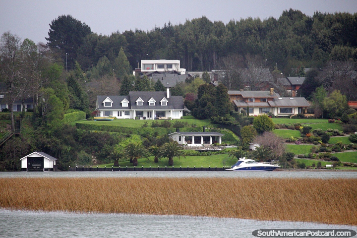Houses and properties of the wealthy on the riverside in Valdivia. (720x480px). Chile, South America.