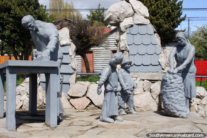 Los Chilotes monument to the immigrants, a family working, bagging produce and woodwork, Coyhaique. (720x480px). Chile, South America.