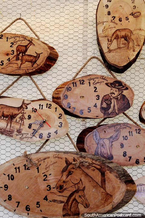 Deer, horses and locals, painted onto to wood made for clocks, Coyhaique crafts fair. (480x720px). Chile, South America.