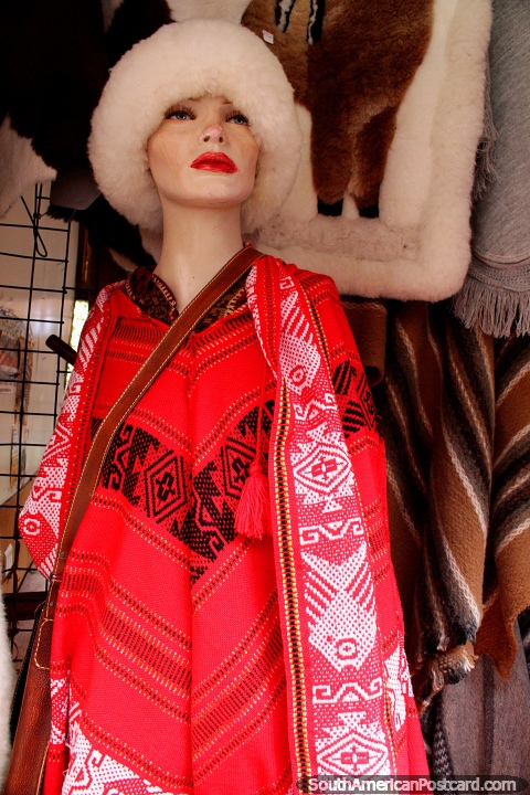 Red, white and black Chilean shawl, a fur hat, Coyhaique fashion. (480x720px). Chile, South America.