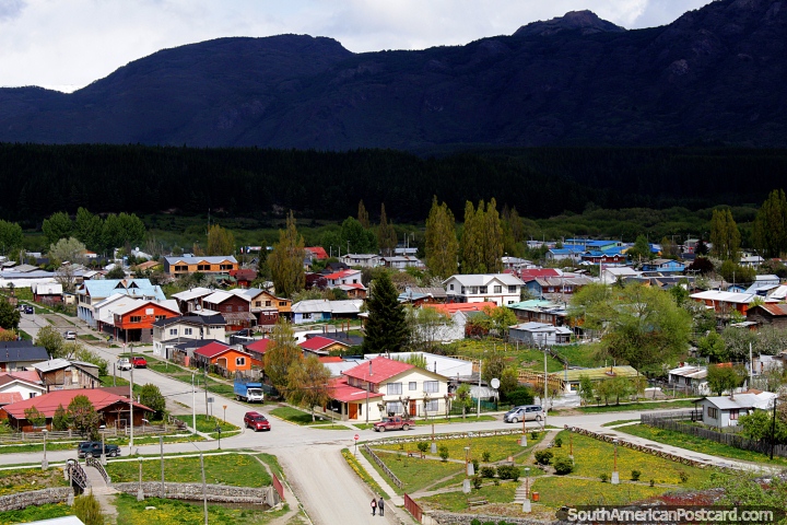 Houses with lots of green space, living is easy in Cochrane in the Patagonia. (720x480px). Chile, South America.