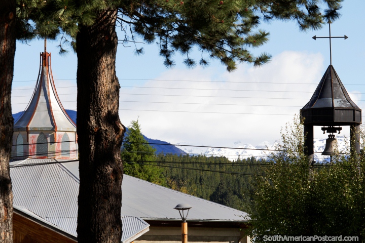 Bell-tower and church steeple in Cochrane, thick forest behind. (720x480px). Chile, South America.