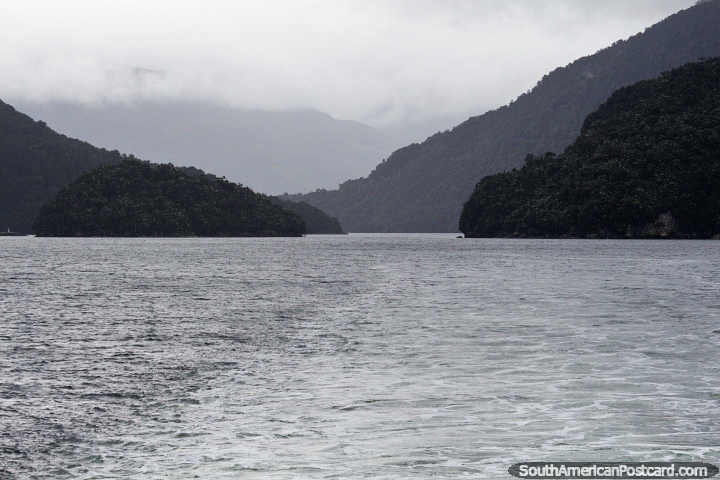 A grey day out on the waters in the fjords during October, cold too! (720x480px). Chile, South America.