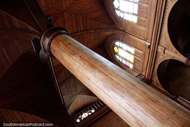Wooden columns, archways and windows inside San Francisco Temple in Castro. (720x480px). Chile, South America.