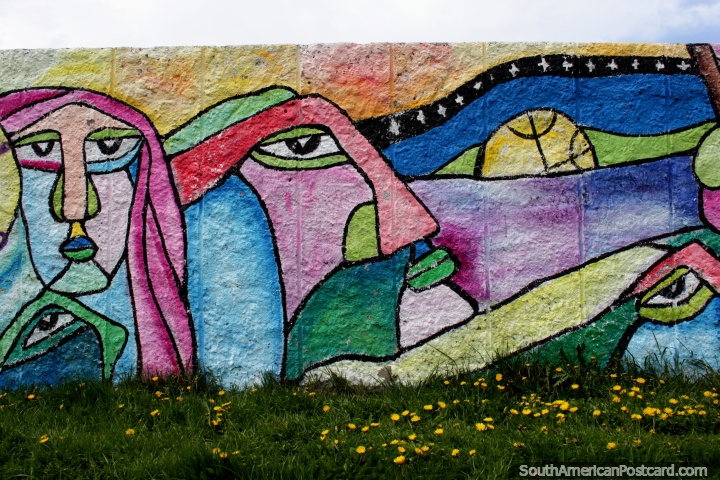 Abstract street art with faces at Plaza Lautaro in Punta Arenas. (720x480px). Chile, South America.