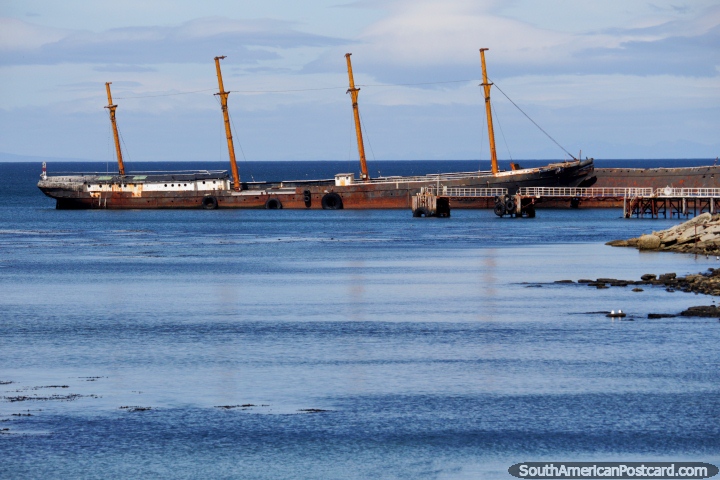 Shipwreck in the harbor in Punta Arenas, shipwrecks always look spectacular! (720x480px). Chile, South America.