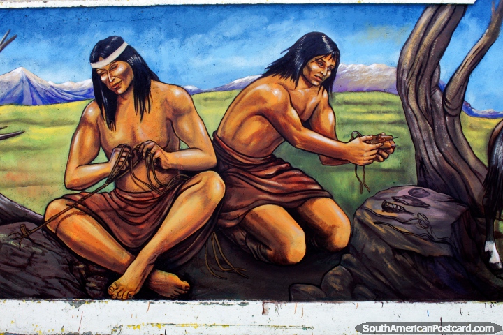 Indigenous people crafting tools and weapons from rope, mural by Eladio Godoy Vera in Puerto Natales. (720x480px). Chile, South America.