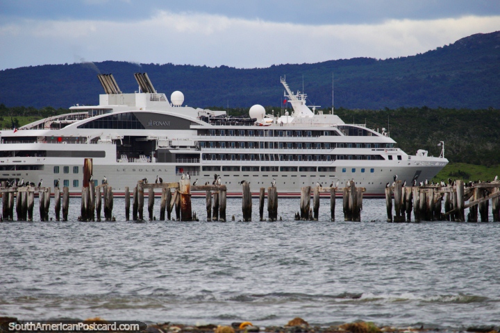 Cruise ship Ponant in the bay of Puerto Natales and the old wooden pier. (720x480px). Chile, South America.