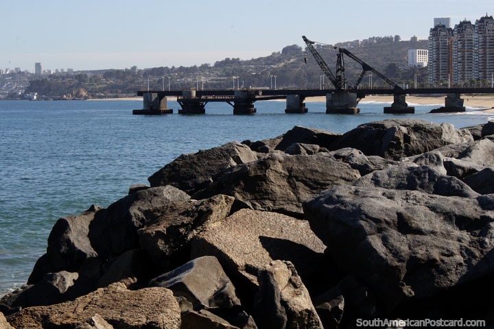 Wharf and beach with rocks in the foreground in beautiful Vina del Mar. (720x480px). Chile, South America.