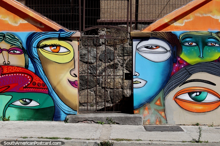 You know you will always have a friendly welcome at this house in Valparaiso with colorful faces at the gate. (720x480px). Chile, South America.