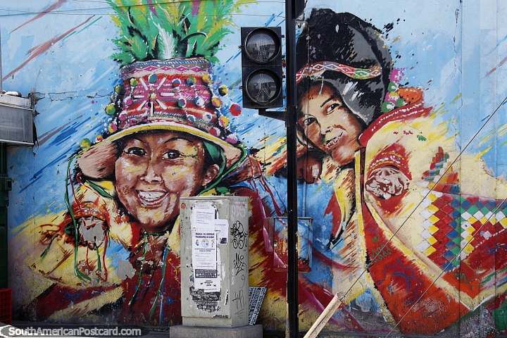Arica and Chile as a whole has amazing street art to discover, 2 indigenous people in traditional clothing. (720x480px). Chile, South America.
