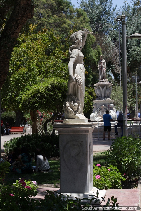 White statues adorn the central plaza in Copiapo. (480x720px). Chile, South America.