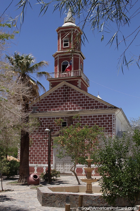 Red brick and wooden church in Montegrande in the Elqui Valley. (480x720px). Chile, South America.