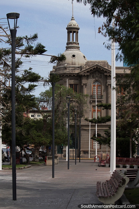 Post office building and tower on the corner of Plaza Colon in Antofagasta. (480x720px). Chile, South America.