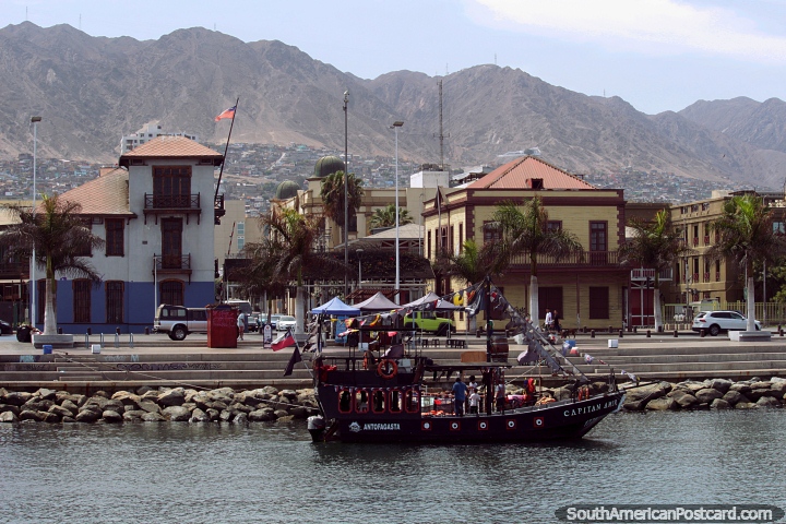 Iconic buildings along the waterfront and a mountainous backdrop in Antofagasta. (720x480px). Chile, South America.