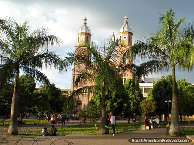 The main plaza in Armenia with trees and palms. (640x480px). Colombia, South America.