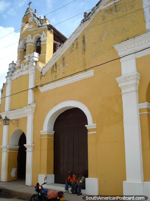 Yellow church Iglesia de San Juan de Dios in Mompos. (480x640px). Colombia, South America.
