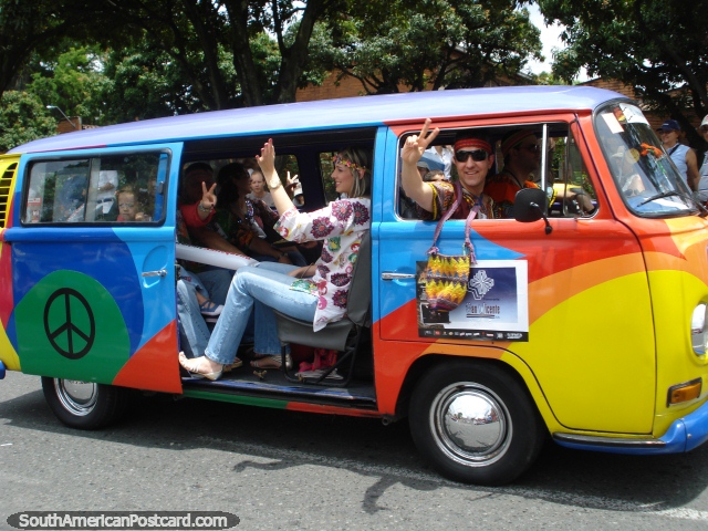 Hippie combi van in rainbow colors at Feria de las Flores in Medellin. (640x480px). Colombia, South America.